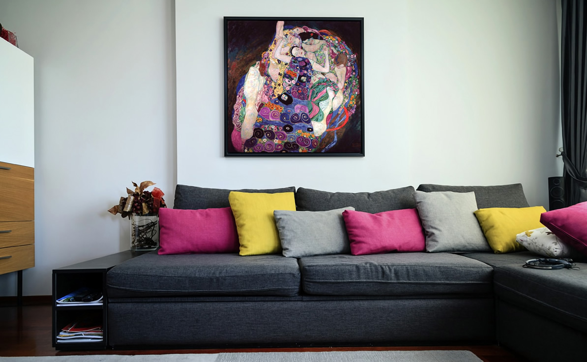 Sofa, colored cushions and Gustav Klimt's painting.